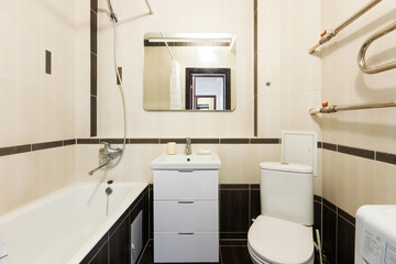 modern bathroom room with toilet and washing machine