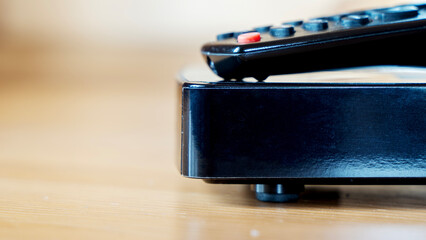 tv set-top box on wooden background