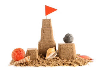 Castle made of sand and seashells on white background