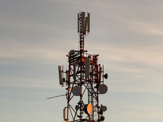 Telecommunications Tower with Antennas and Dishes at Sunset. Mátraszentimre, Galyatető, 3234...