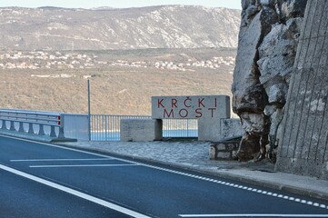 Plaque on the Krk bridge with a name of the bridge on Croatian language (Krk bridge) 