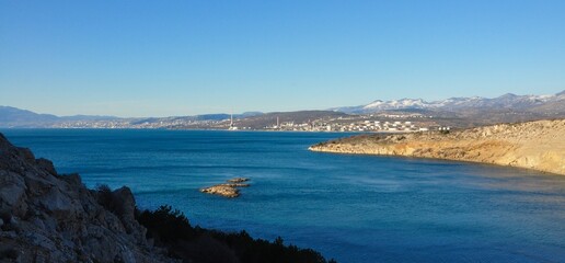 Island Krk, Croatia. Kvarner, island Krk  Krcki cider, Adriatic Sea destination coast-landscape vegetation, rocks, mountains view.