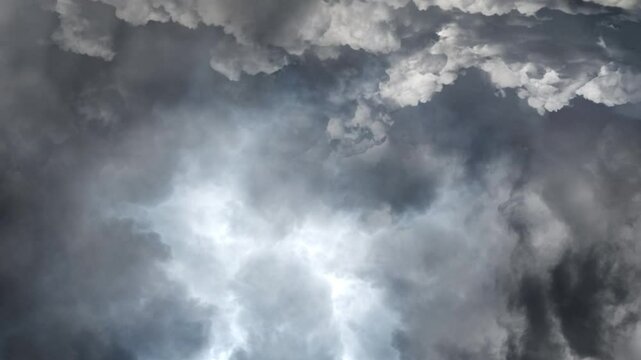 a thunderstorm that occurs in the sky with dark clouds