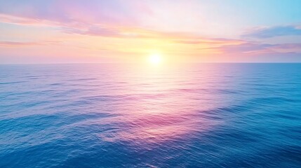 Obraz premium Serene ocean scene with vibrant sunset sky, blending colors of pink and blue, reflected on calm water