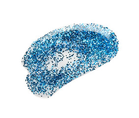 Smear of blue glitter on white background