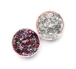 Jars with different glitters on white background