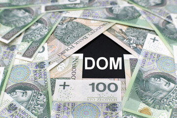 Real estate market, house symbol, Polish money - hundred zloty.
