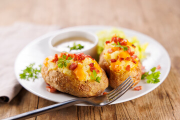 stuffed baked potato with cheese and bacon