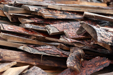 Broken boards. A pile of broken boards at a sawmill. Selective focus