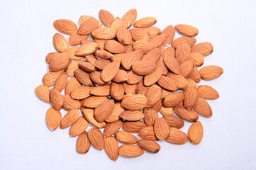 almonds, raw almonds, almond kernels, platefuls of almonds, nuts