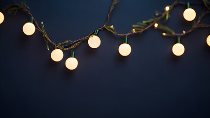 String of lights hanging on a dark blue wall creating a festive atmosphere