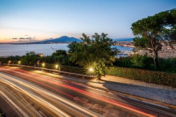 Naples Vesuvius with the trails of cars in the foreground taken at night with long exposure photos. Italy