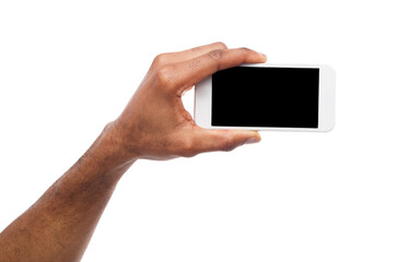 Man taking picture using smartphone. Black hand holding smartphone and shooting photo, isolated on white