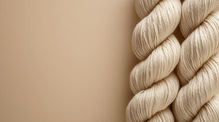 Chocolate mousse yarn skeins mockup with negative space on neutral beige background. Natural cotton yarn in rolls. Knitting and craft design
