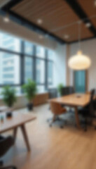 Blurred modern office with sleek workspace furniture and artistic touches