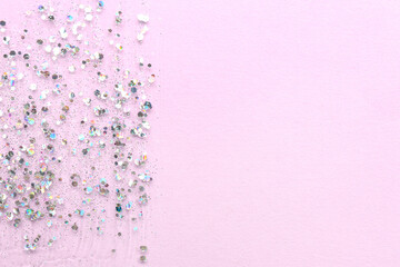 Silver glitter stroke on lilac background, closeup
