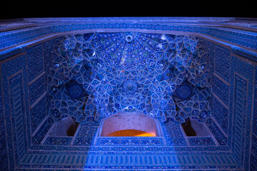 The Jāmeh aka jame Mosque of Yazd beautiful persian architecture with mosaic tile work ceramic geometric shapes minarets islamic architecture at night 