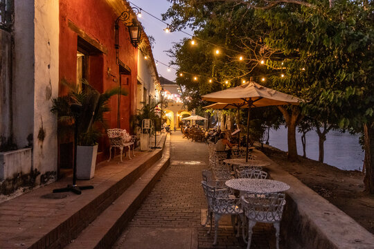 Night view of riverside restaurants in Santa Cruz de Mompox, Colombia