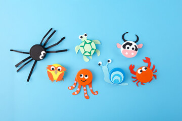 Colorful animal crafts, bottle caps and paper, kids educational projects, spider, crab, snail, elephant, ladybug, octopus, fish, turtle, owl, mouse, DIY activity, preschool crafts