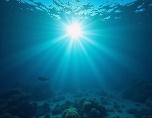 Fototapeta premium Light filters through the surface of the deep blue sea, creating a serene atmosphere with vibrant rays reaching down into the water's depths during the day. Generative AI