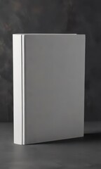 Close-up of a plain white blank book resting on a dark grey background,  dark,  book,  monochrome