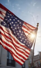 Obraz premium Close-up of American flag waving high in air, sunlight filter, blur , fabric, rays
