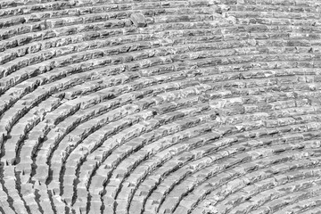 Mediterranean cityscape, in black-and-white color - view of the spectator seats in the theater of the ancient city of Myra, near the Turkish town of Demre, Antalya Province in Turkey