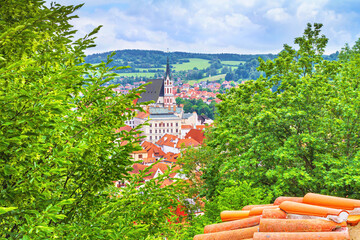 Summer cityscape - top view of the Cesky Krumlov and its surroundings, Czech Republic