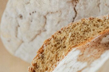 Stale bread. Moldy bread.Expired product with mold. Slices of moldy bread on a wooden cutting board. White mold close-up on yeast bread. Expired product expiration date