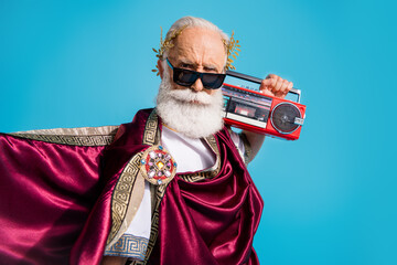 Photo of nice man have fun carnival halloween party antique hero in traditional clothes isolated on blue color background