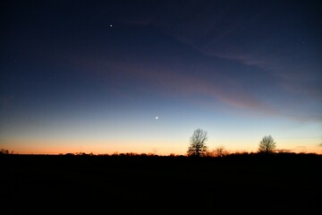Moon and Star in Twilight Sky