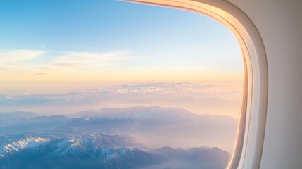 Majestic Mountain Range Aerial Panorama: Spectacular Landscape View from Airplane Window