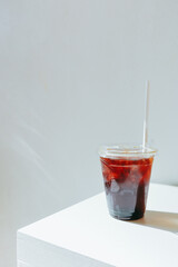 iced coffee on white table 