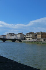 Obraz premium The Daily Life of the Arno River in Florence, Romantic Italy