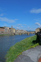 Fototapeta premium The Daily Life of the Arno River in Florence, Romantic Italy