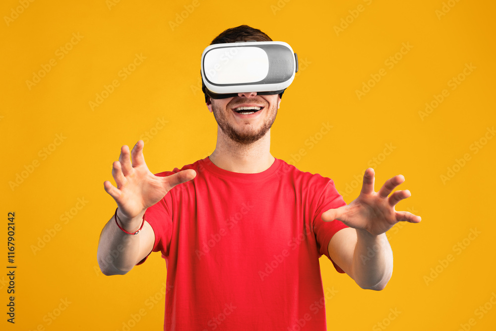 Aufkleber cyberspace and futuristic technology concept. smiling guy wearing vr headset touching air during vir