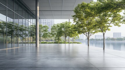 Modern, minimalist architectural exterior featuring a paved plaza, glass facade, and lush greenery overlooking a calm lake and city skyline.