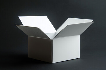 White box flipping open isolated on a black background