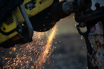Sparks flying while cutting metal