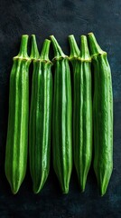 Fresh Green Okra Pods Arranged on a Dark Background Showcasing the Vibrant Colors and Textures of This Nutritious Vegetable