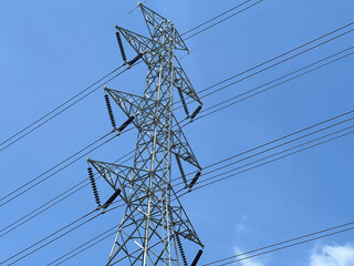 high voltage pylon on the sky background