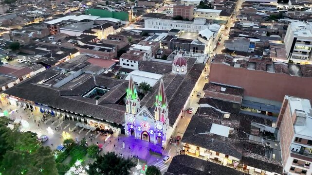 Aereal view of the town of La Ceja del Tambo, and at the center the Bas&iacute;lica Menor de Nuestra Se&ntilde;ora del Carmen during Christmas