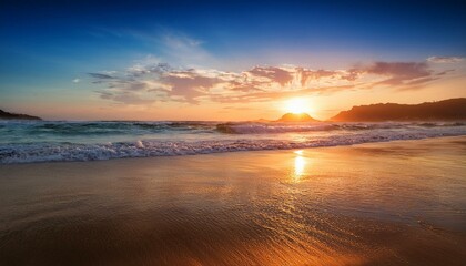 Naklejka premium A tranquil beach sunset with waves gently lapping at the shore.