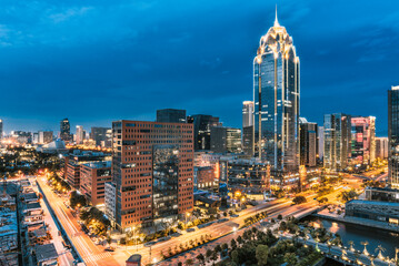 Naklejka premium Ningbo city skyline at twilight, China
