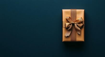 Dark blue background with a golden ribbon and gift box on the right side, creating a birthday or Christmas present concept.