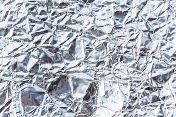 Abstract crumpled silver paper texture background, blank wrinkle paper pattern background