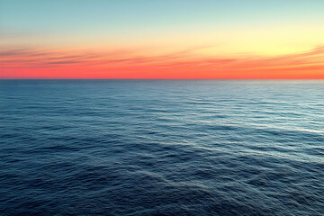 Obraz premium Serene ocean sunset with vibrant sky.