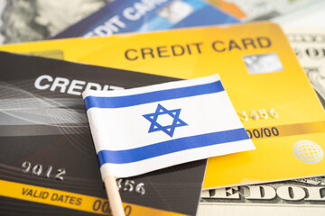 Israel flag on coin and banknote money, finance trading investment business currency.