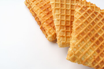 Deliciously crispy waffle cones ready for ice cream delights on a clean surface