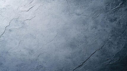 Naklejka premium Grungy abstract background idea. A textured surface of slate stone in shades of blue, ideal for backgrounds and designs.